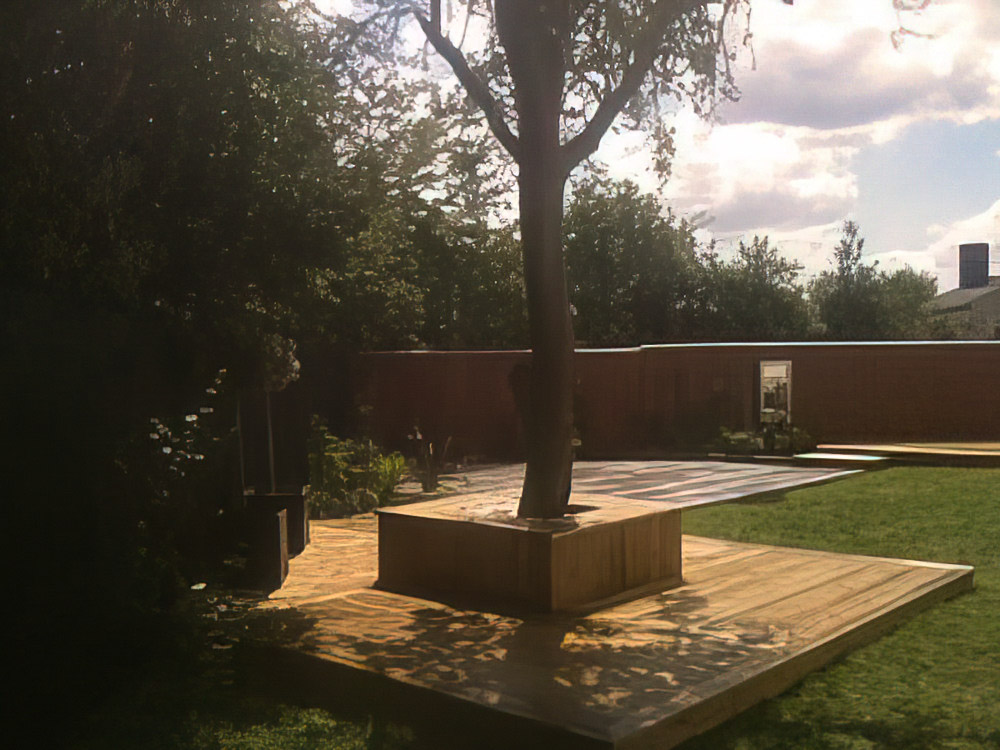 Greensteds Tree Surgery - wooden decking around tree